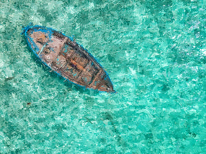 Boat on Clear Blue